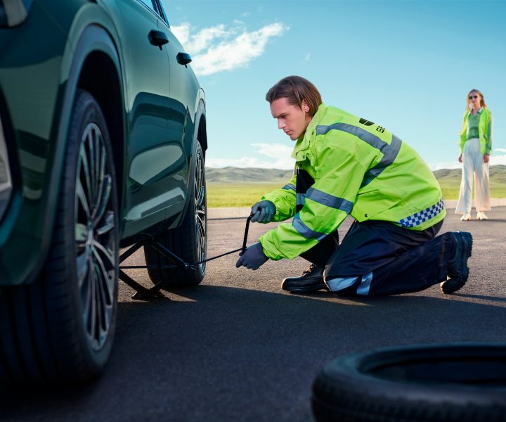 Roadside assistance changing a tyre