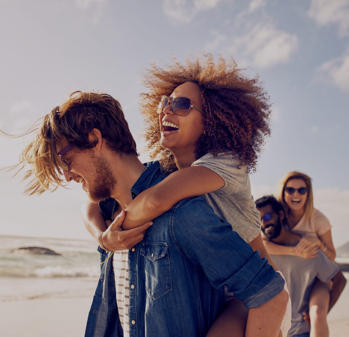 Friends laughing together outdoors