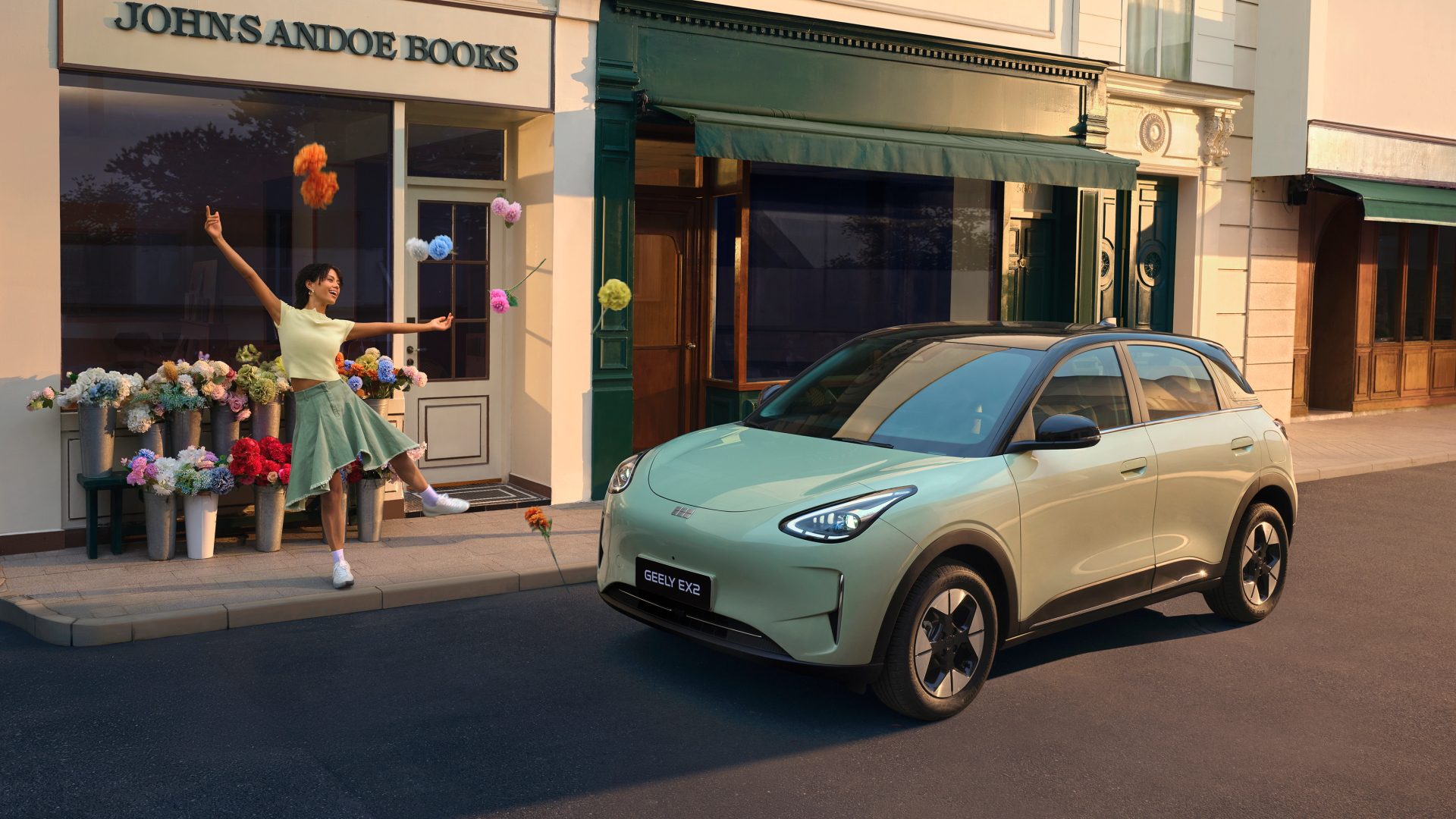 Woman celebrating next to a green Geely EX2